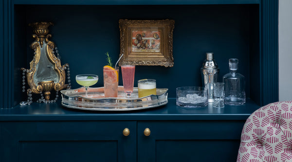 Three mocktails served in vintage style glassware