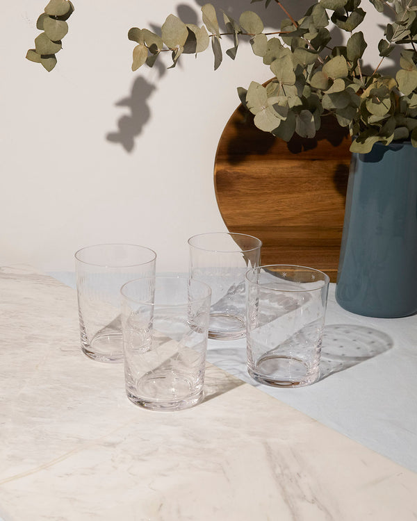 A Set of Four Crystal Large Tumblers with Lens Design